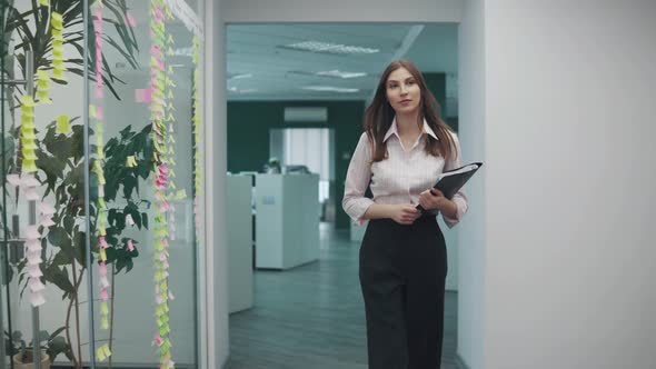 Young Business Woman with Empty Office Documents