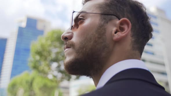 Businessman walking on the street.