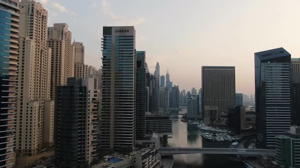 High Angle View on Dubai Creek with Lots of Amazing Skyscrapers and Yachts