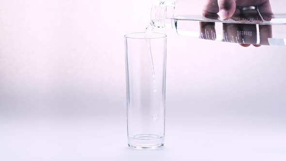 Pouring Water into Glass