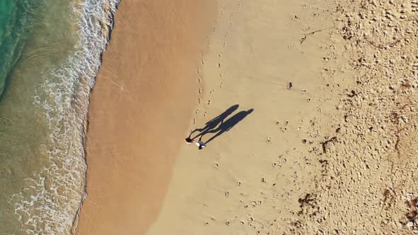 Man and lady happy together on tropical island beach holiday by turquoise ocean with clean sand back