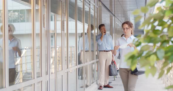 Businesswoman Put on Safety Mask Entering Business Center