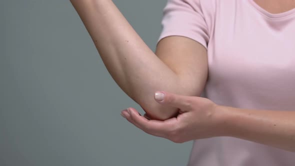 Woman Holding Painful Elbow, Joint Inflammation, Arthritis Problem, Health Care