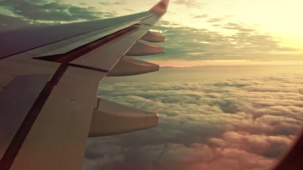 Sunset Sky and Airplane Wing