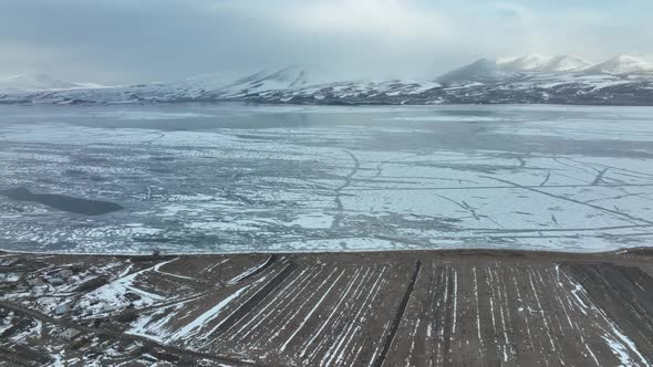 Aerial view of frozen Lake Paravani. The largest lake in Georgia