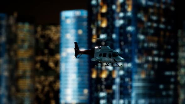 Slow Motion Helicopter Near Skyscrapers at Night