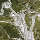 Cars passing through curve in mountainous road. Mountain serpentine road - VideoHive Item for Sale