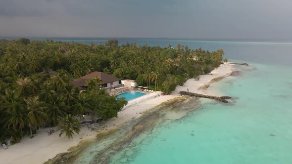 Incredible view of the beautiful Maldiveswith green trees, white sand and turquoise water, where ho