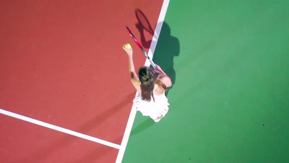 Top View of a Woman Playing Tennis on the Court