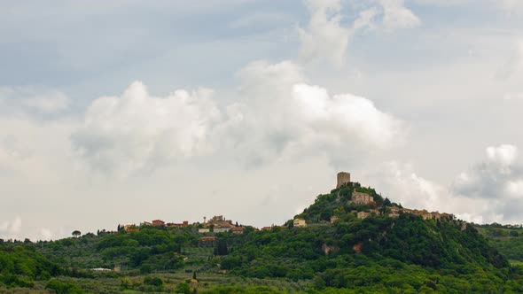 Time lapse of clouds over town of Pienza in Tuscany Italy