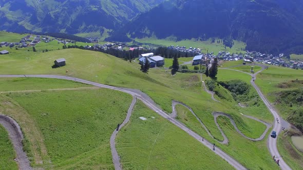 Aerial view of a mountain biker on a scenic singletrack trail