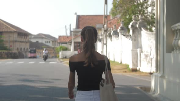 Lady Approaches Dutch Reformed Church Against Transport