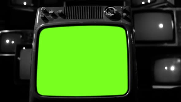 Old Television turning on Green Screen with Static Noise. Black and White Tone.