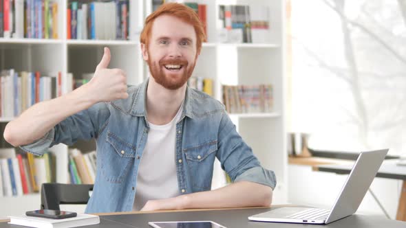 Thumbs Up By Casual Redhead Man at Work