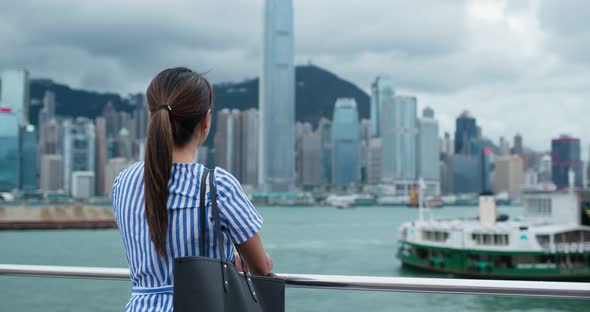 Woman look at view in Hong Kong