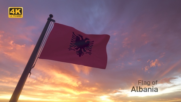 Albania Flag on a Pole with Sunset / Sunrise Sky Background - 4K