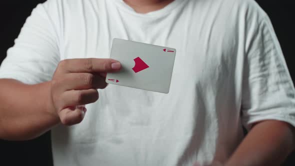 Magician Showing His Trick With Usual Cards, Change Card