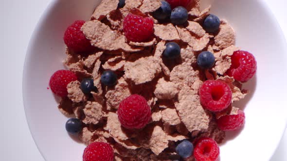 Cenital View of Bowl with Cereal and Raspberries