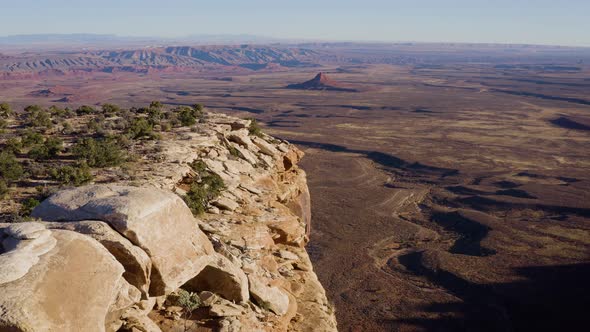 Aerial shot of the cliffs along the edge of Cedar Mesa in Southern Utah