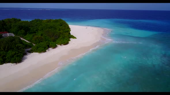 Aerial top view panorama of exotic seashore beach vacation by blue ocean with white sandy background