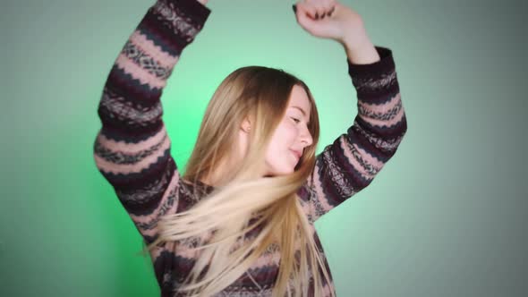 A Girl with a Bright Appearance Dancing on Camera