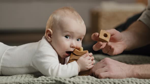 Caucasian Family Unrecognizable Father Daddy Play with Little Daughter Son Infant Newborn Toddler