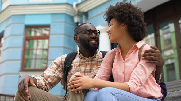 Girlfriend and Boyfriend Having Fun Together, Sitting Stairs, Urban Date Outdoor