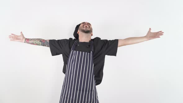 Funny Male Chef Dancing and Singing with Arms Wide Open