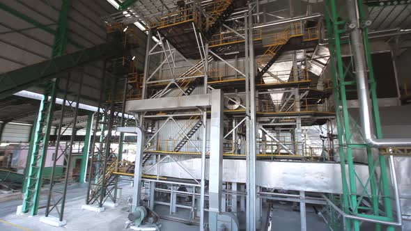 Production machine processing and producing a palm oil by a huge machine in Malaysia (Kilang Kelapa