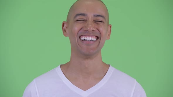 Face of Happy Handsome Bald Man Smiling and Laughing
