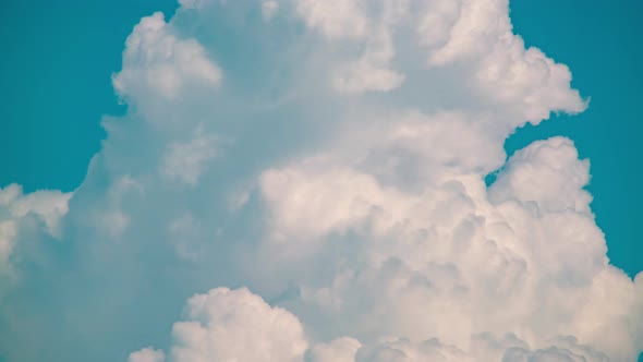 Time lapse telephoto lens blue sky with clouds background