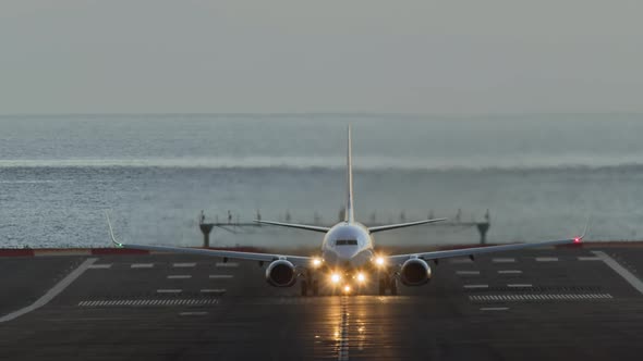 Commercial Jet Airplane Taking Off Runway