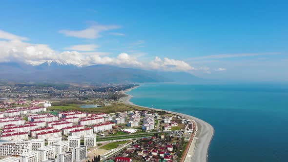 Aerial View of Adler, Sochi Beach, Town and Mountains
