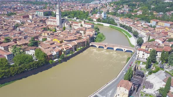 Panoramic aerial drone view of Verona, Italy. The drone moves away filming a video of the panorama