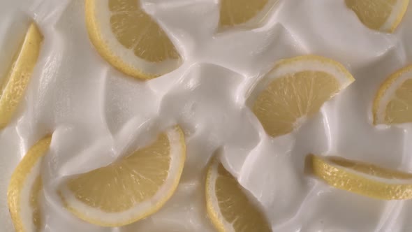 Yogurt decorated with fresh lemon slices - Swirl shot