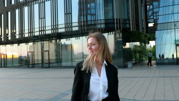 Funny Business Woman in Suit Making Fun Playing with Her Hair Beautiful Blonde Tossing Her Hair