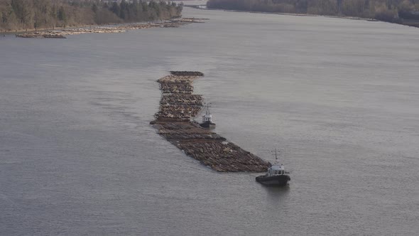 Logs Pulled By a Tugboat on Fraser River