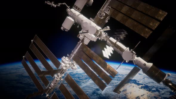 International Space Station in Outer Space Over the Planet Earth alt