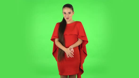 Pretty Young Woman Is Saying Wow with Coquettishly Smiling, Green Screen