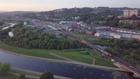 Aerial shot of a train pulling in to Exeter St Davids