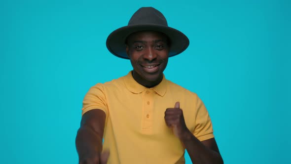 Portrait of Smiling African Man Showing Thumbs Up