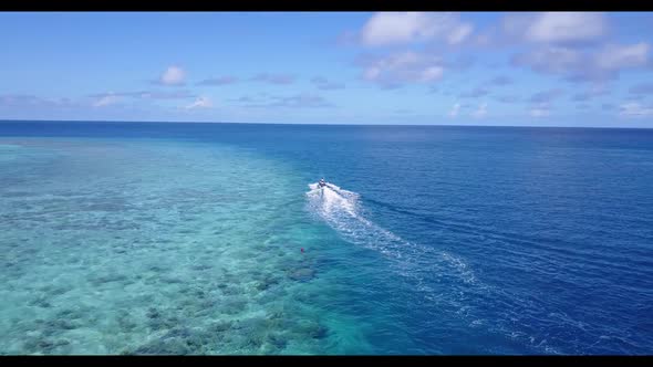 Aerial drone shot sky of tropical bay beach journey by aqua blue sea and white sand background of a 