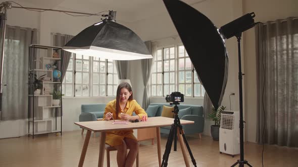 Beauty Blogger Woman Filming Daily Make Up Routine Tutorial On Camera