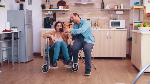 Cheerful Disabled Woman in Wheelchair