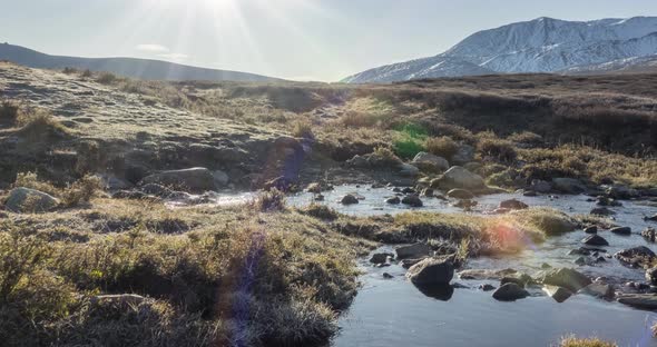 Mountain Meadow Timelapse at the Summer or Autumn Time. Wild Nature and Rural Valley. Sun Rays