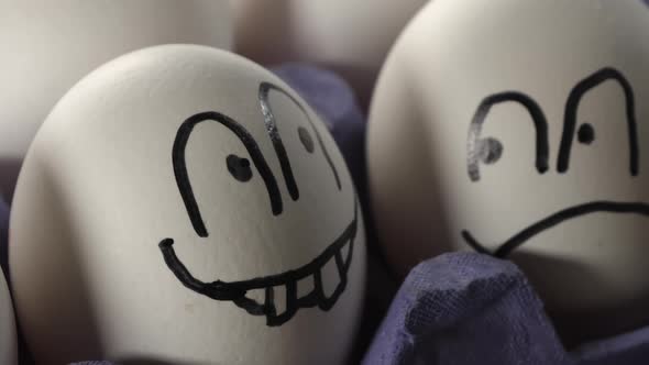 The Frown and Smiley Face on the White Eggs