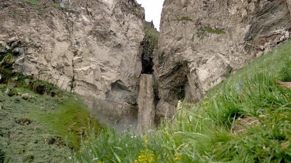 Dirty Waterfall Sultan High in the Mountains Near Elbrus in Summer