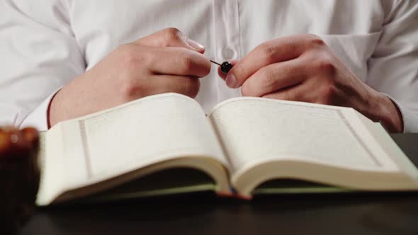 Man Praying Reading Quran Closeup Islamic Religion