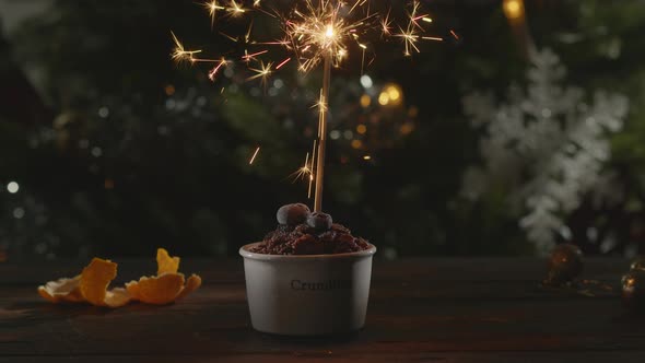 Crumble Dessert with Sparkler in the Spirit of Christmas