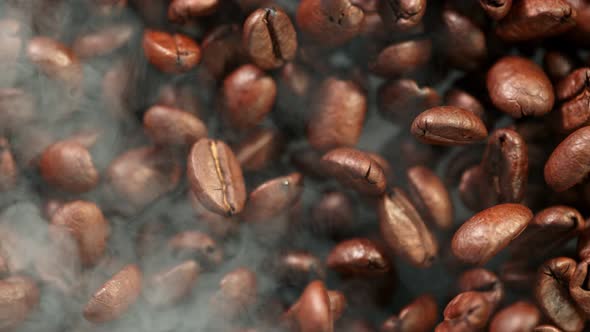 Super Slow Motion Detail Shot of Coffee Beans and Smoke Background at 1000Fps